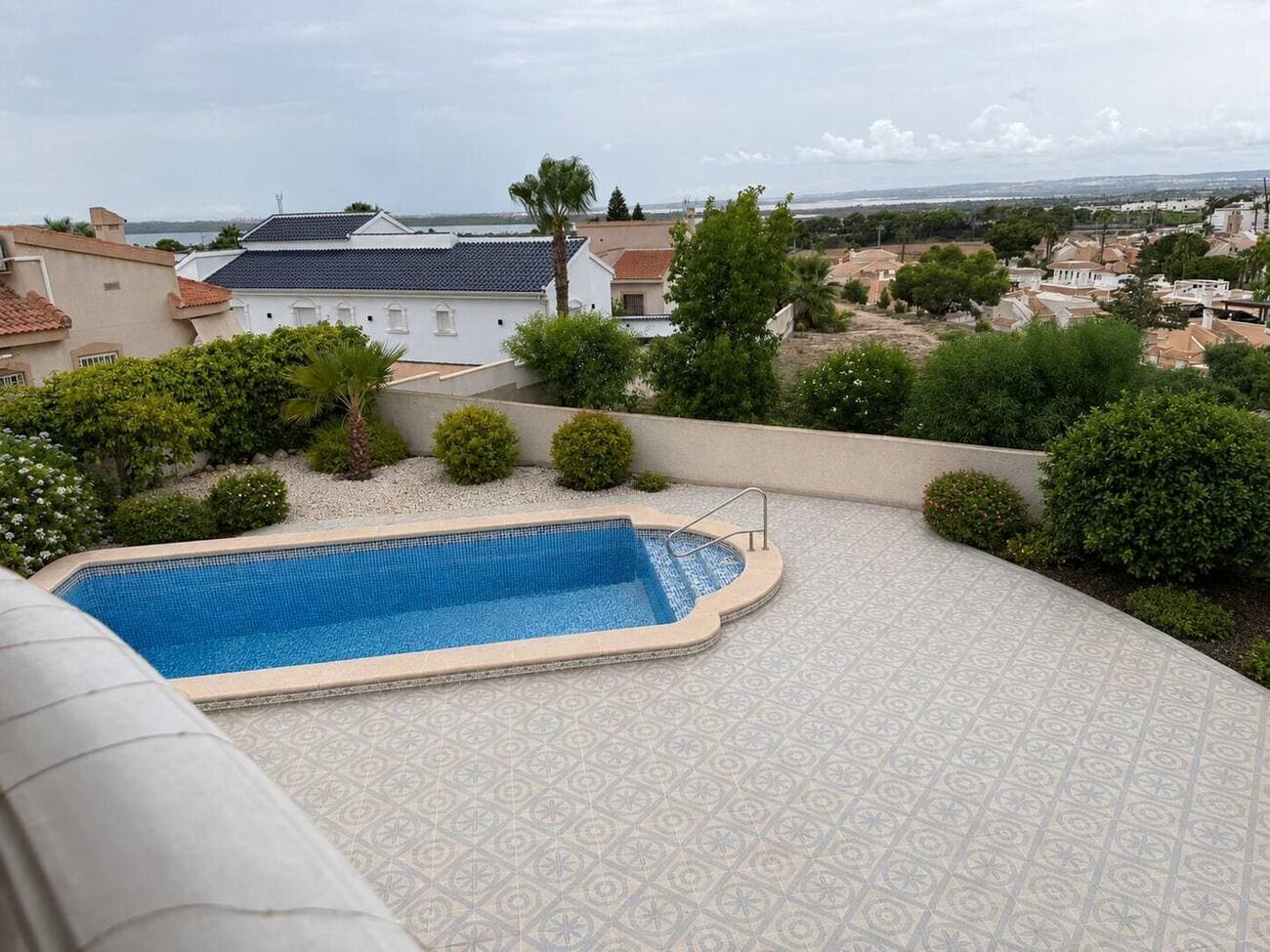 Private pool and the open horizon towards the La Mata lagoon