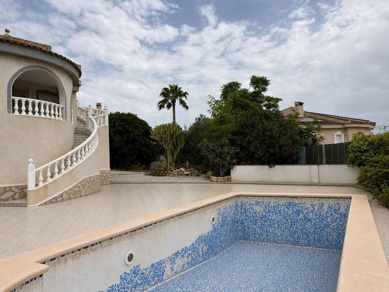 Pool and curved staircase