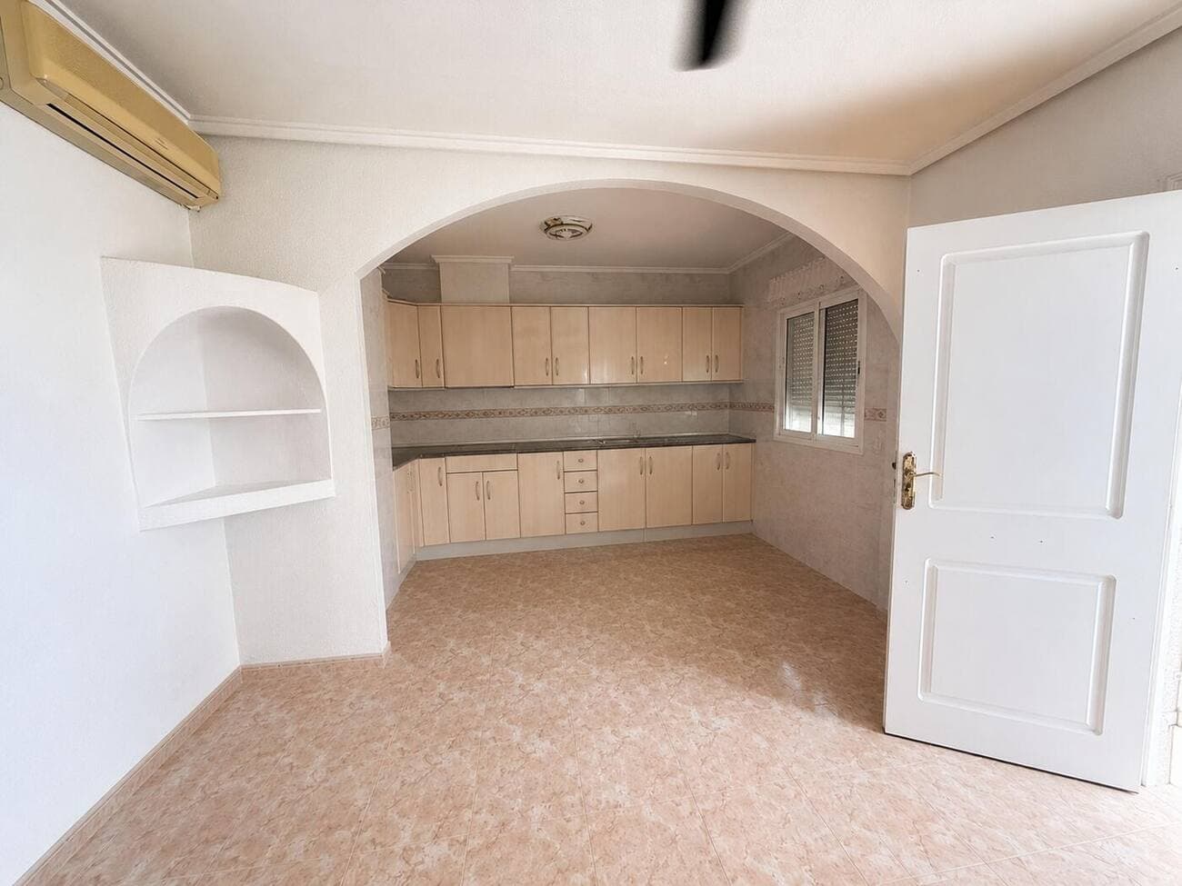 Kitchen two with its own dining area and air conditioning