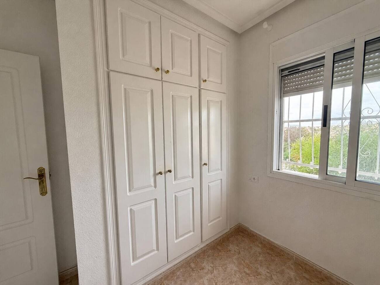 Bedroom with fitted wardrobe