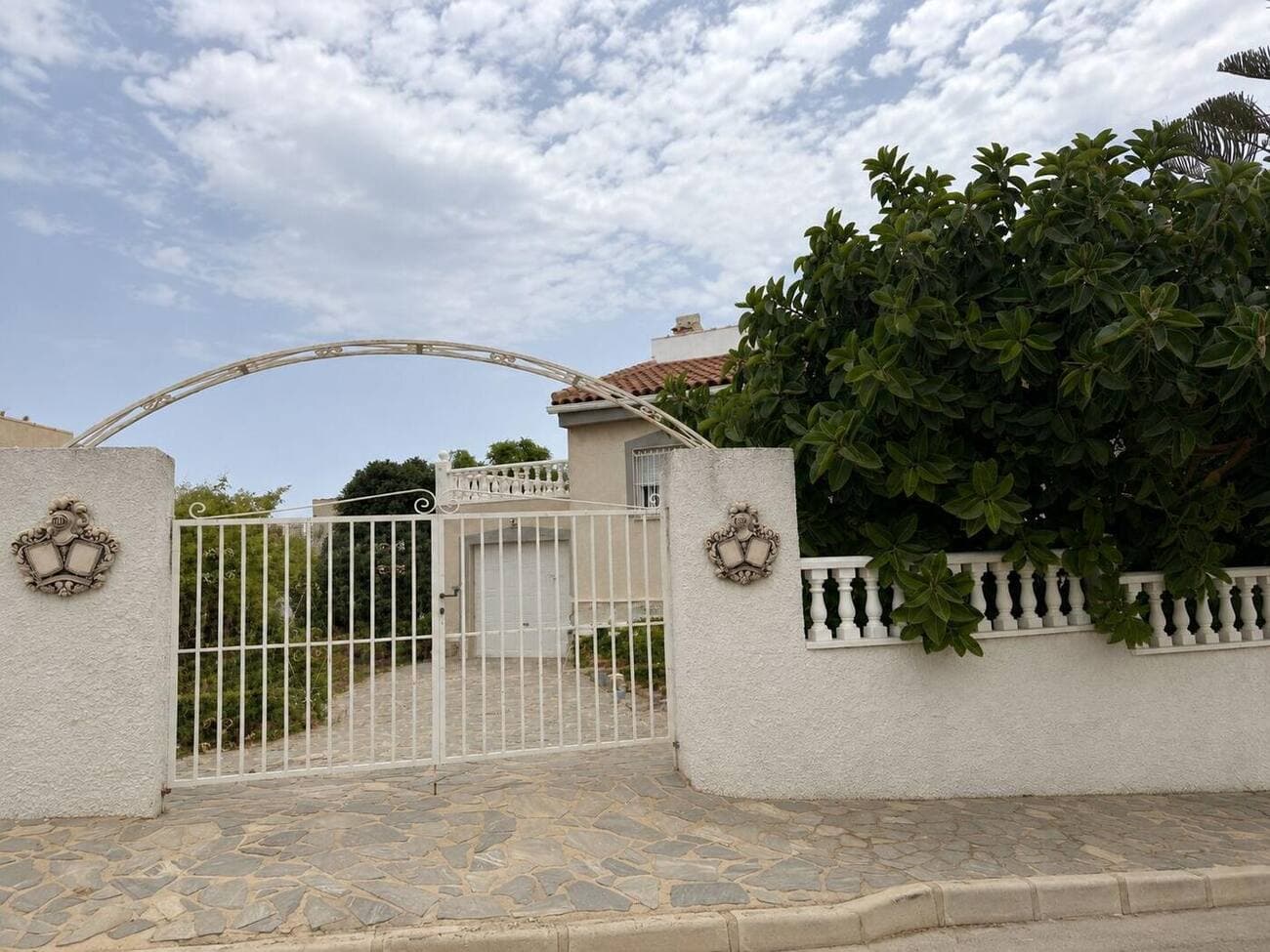 Gated entrance to the plot